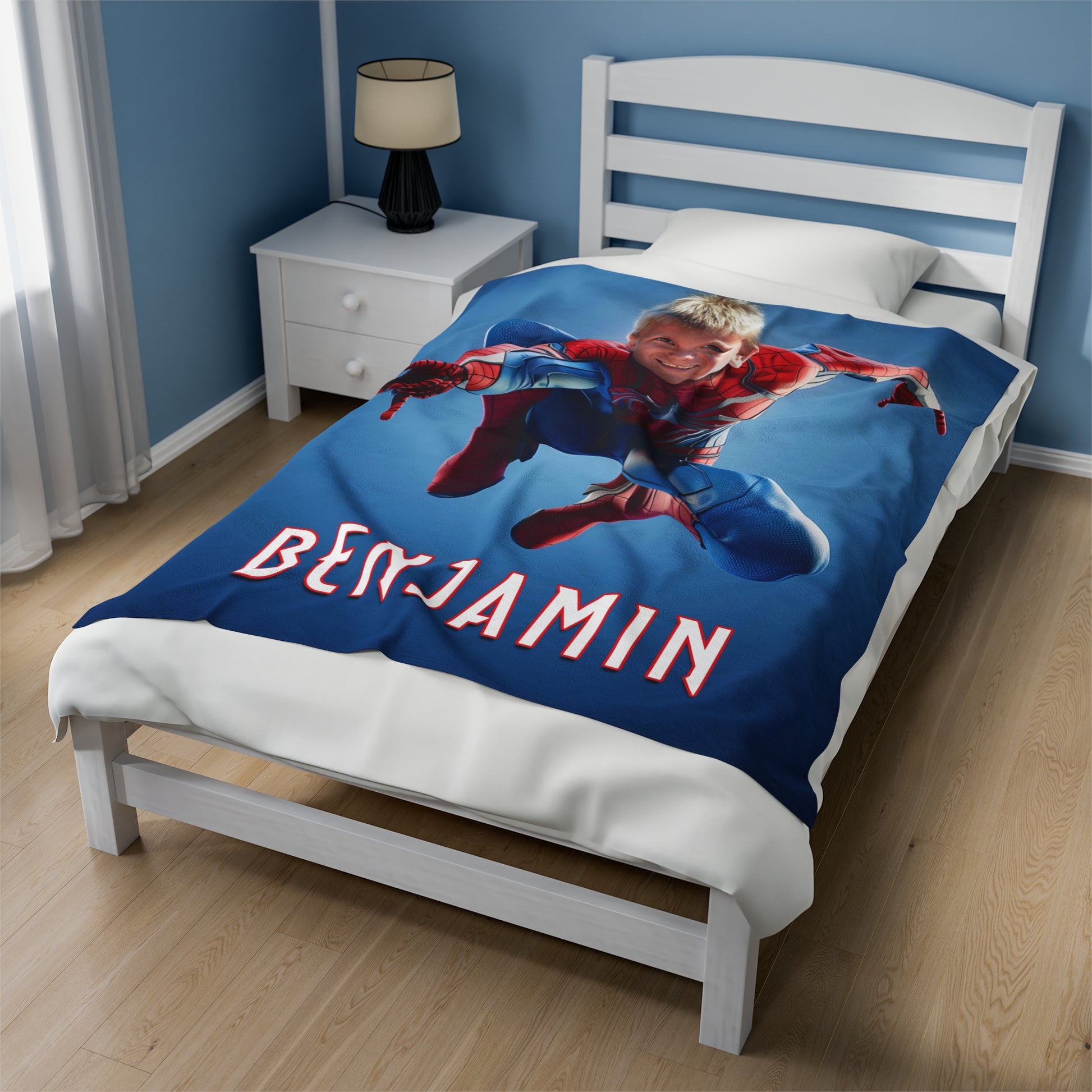 the 50 x 60 inch superhero blanket displayed on a bed
