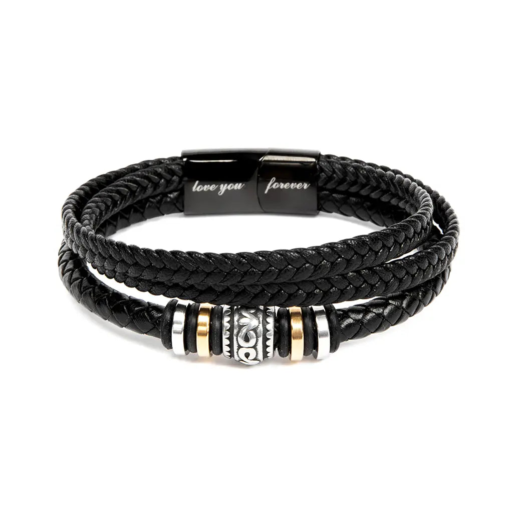 Engraved black braided leather bracelet with metal beads on a white background
