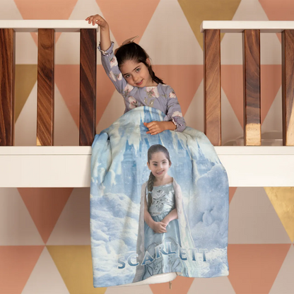 Girl sitting with her custom blanket with face and name