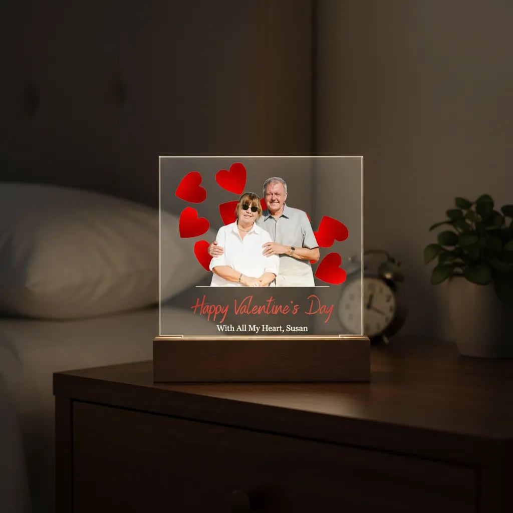 Valentine's Day Acrylic plaque with LED on a nightstand.